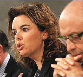 Guindos, Sáenz de Santamaría y Montoro.