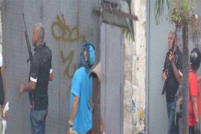 Dos heridos de bala por paramilitares chavistas en una manifestaci&oacute;n opositora en Caracas