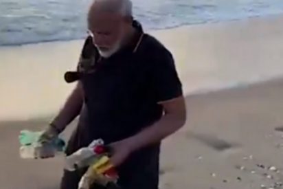As&iacute; recoge basura en la playa el primer ministro indio Modi antes de reunirse con l&iacute;der chino Xi