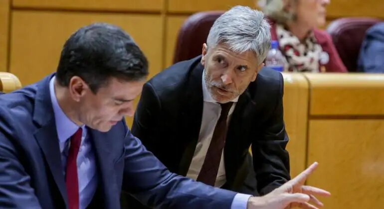 Pedro S&aacute;nchez y Fernando Grande-Marlaska. 